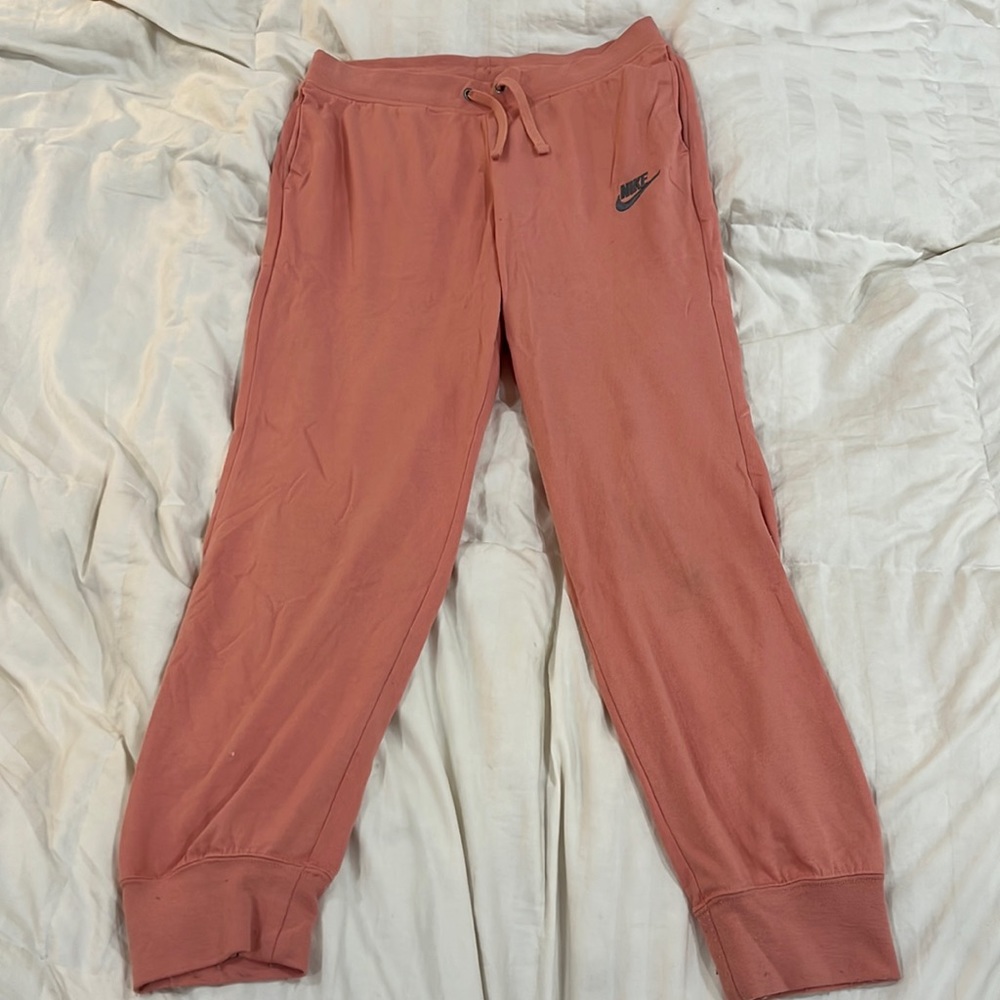 Nike joggers coral color